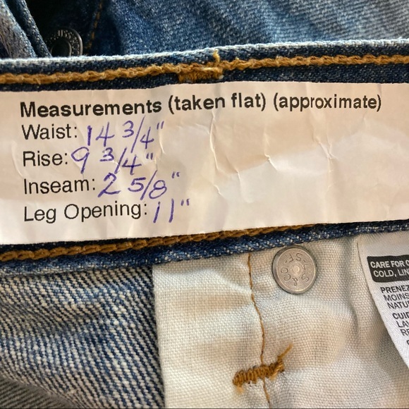 Levi’s Raw Cuffed Button Fly Distressed Shorts - Picture 10 of 11